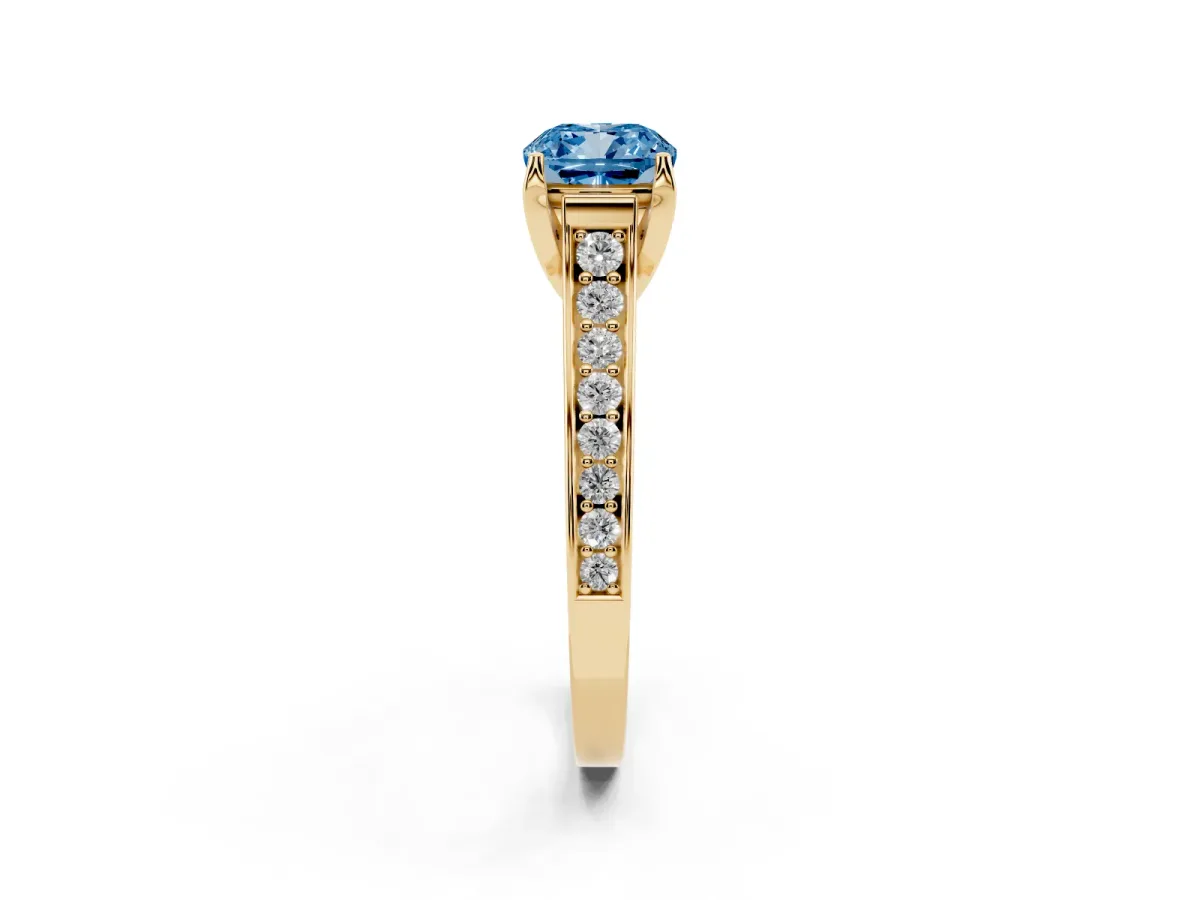 Fancy Blue Cushion Cut Brilliant Cut Diamond Engagement Ring with Pavé Band and Four-Prong Setting Yellow gold