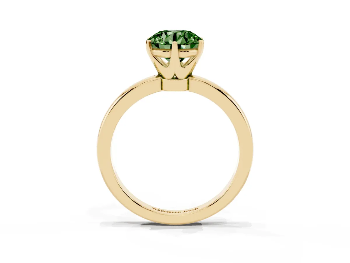 Fancy Green Round Cut Solitaire Diamond Ring with Six-Prong Setting on a Classic Band Yellow gold