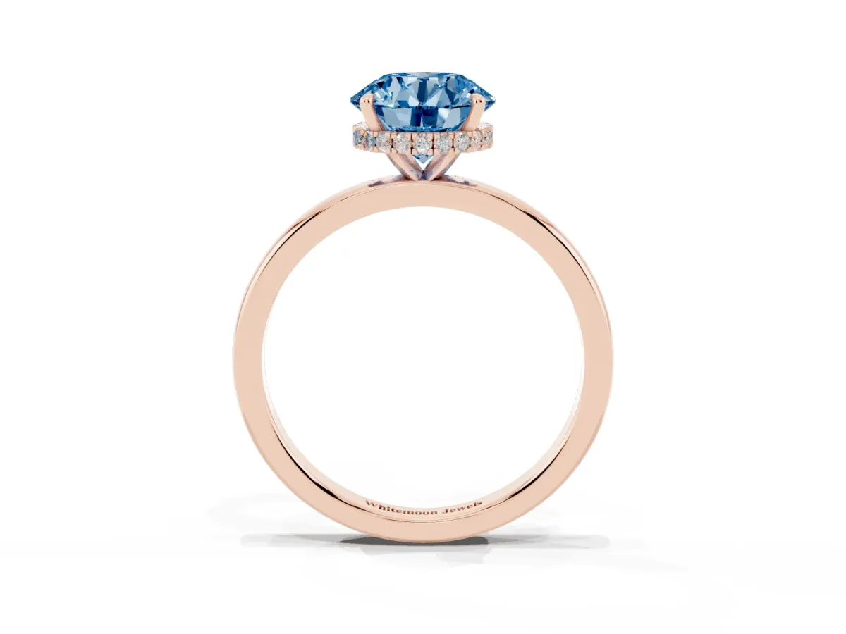 Fancy Blue Round Cut Solitaire Engagement Ring with Cathedral Band and Four-Prong Setting Rose gold