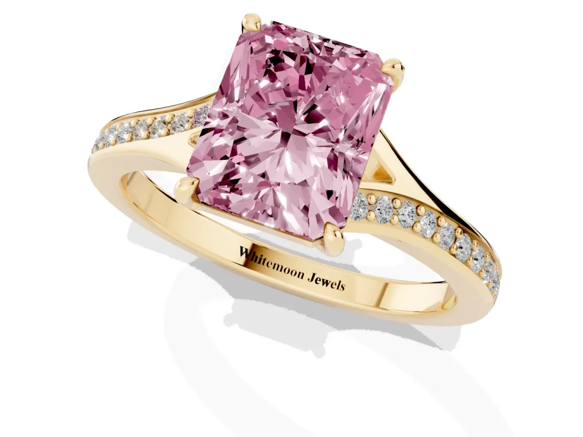 Fancy Pink Radiant Cut Diamond Solitaire Ring with Pavé Band and Prong Setting Yellow gold