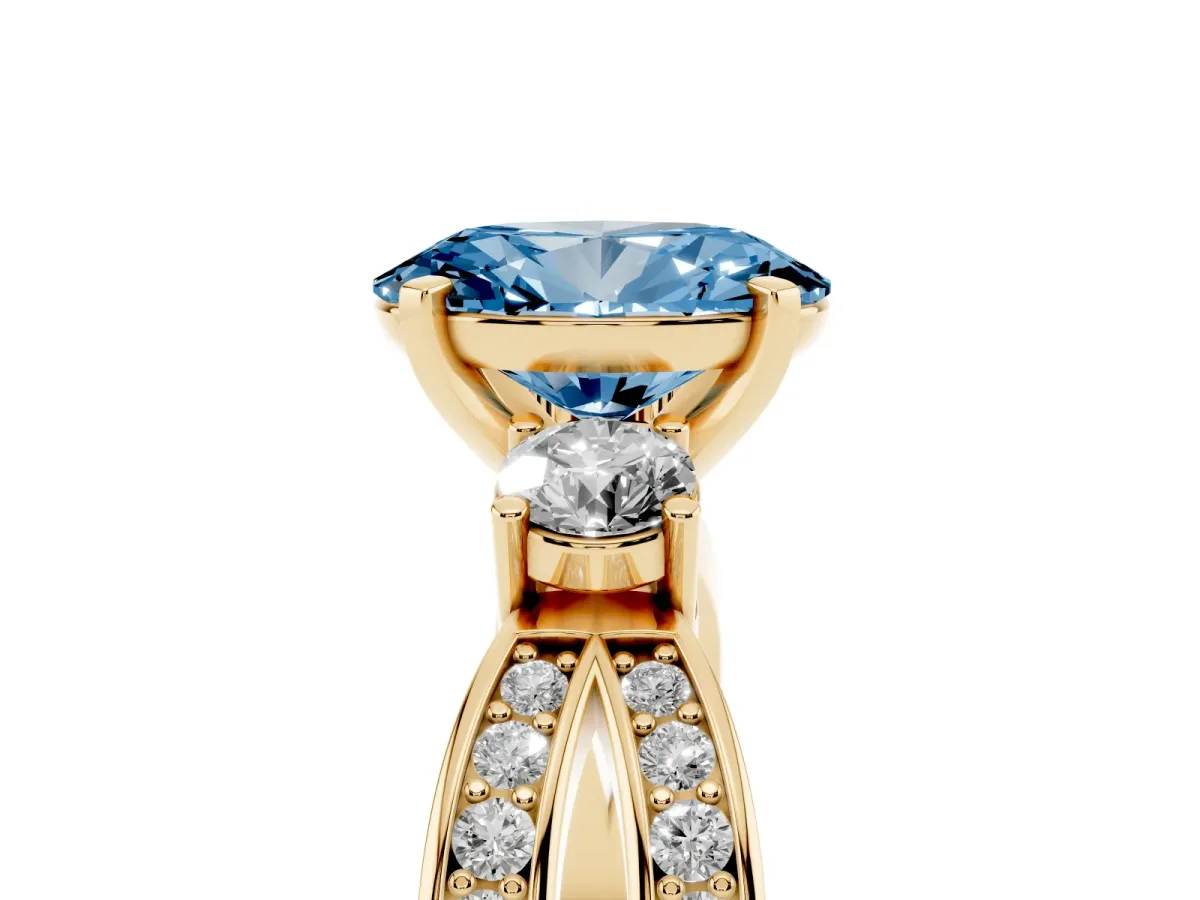 Fancy Blue Three-Stone Oval Cut Cut Diamond Twist Band with Prong Setting Yellow gold