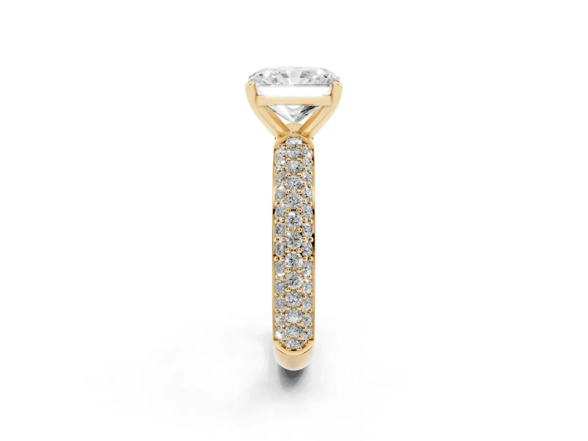 Radiant Cut Diamond Solitaire Ring with Prong Setting and Pavé Band Yellow gold