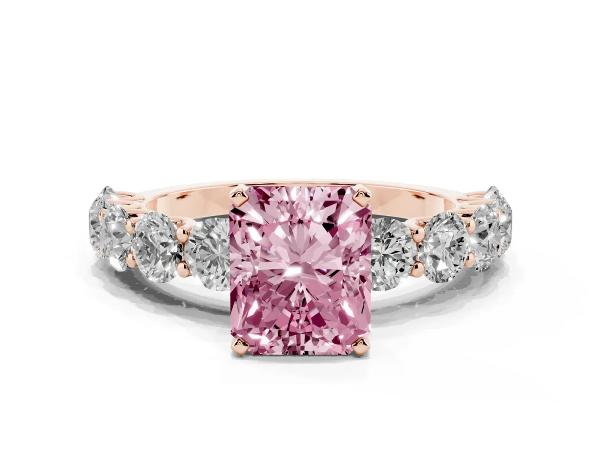 Fancy Pink Radiant Cut Diamond Prong Setting with Side Stones on a Pave Band Rose gold