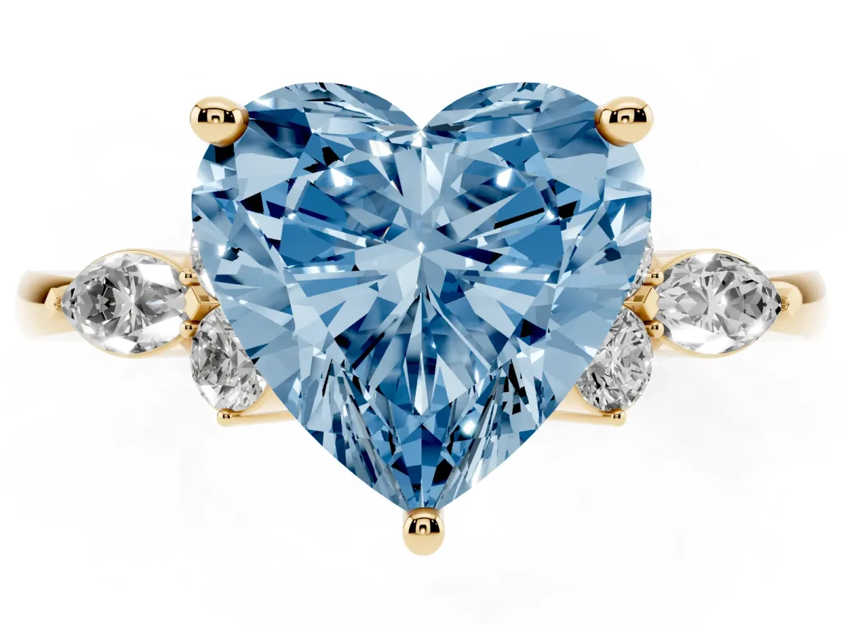 Fancy Blue Heart Cut Brilliant Diamond Solitaire Ring with Pear Side Stones and Four-Prong Setting Yellow gold