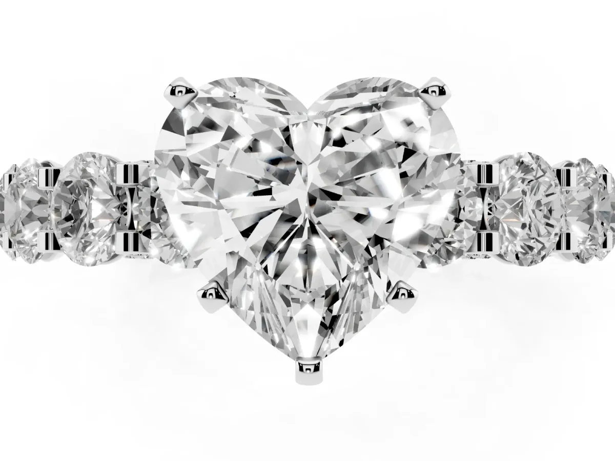 Heart Cut Diamond Side Stone Engagement Ring with Four-Prong Setting Silver