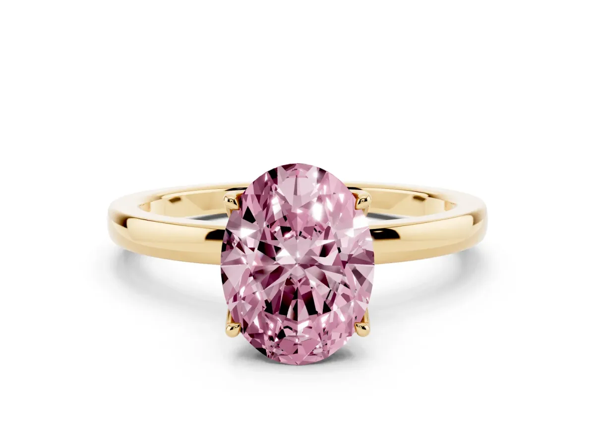 Fancy Pink Oval Cut Diamond Solitaire Ring with Thin Band and Prong Setting Yellow gold