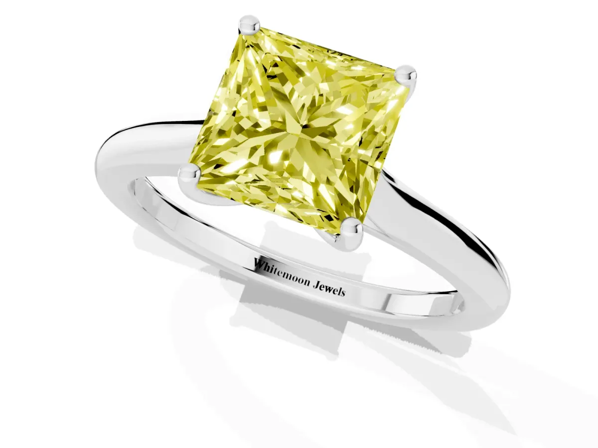 Fancy Yellow Princess Cut Cut Solitaire Ring with Cathedral Band and Four-Prong Setting Silver