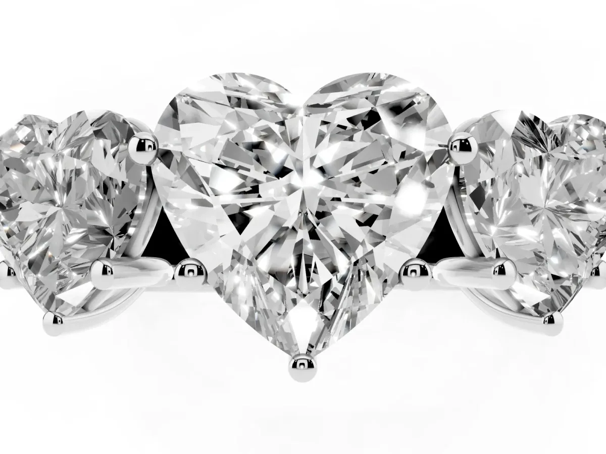 Heart Cut Three-Stone Diamond Ring with Prong Setting on a Classic Band White gold