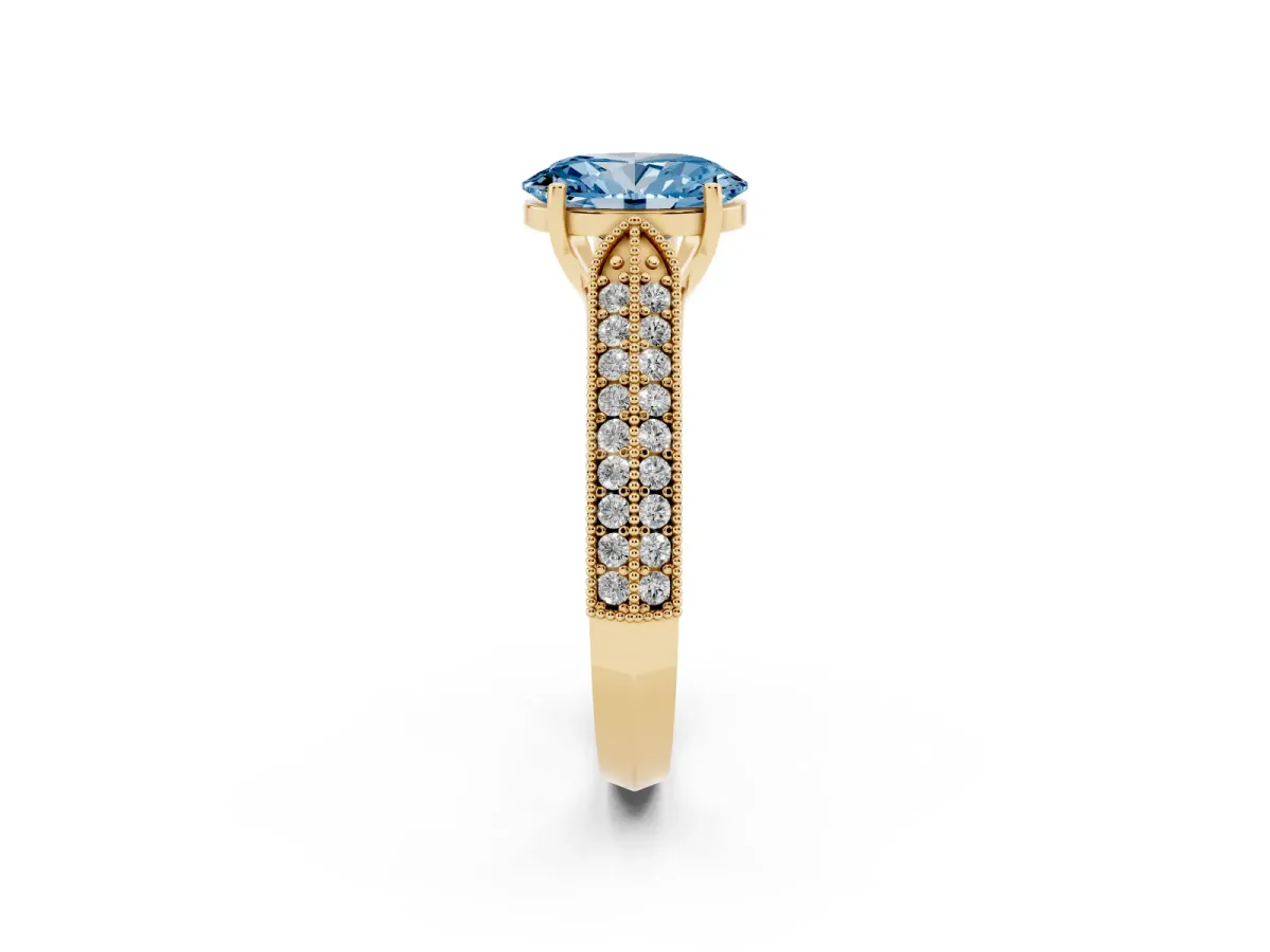 Fancy Blue Oval Cut Cut Pave Split Shank Engagement Ring with Four-Prong Setting Yellow gold