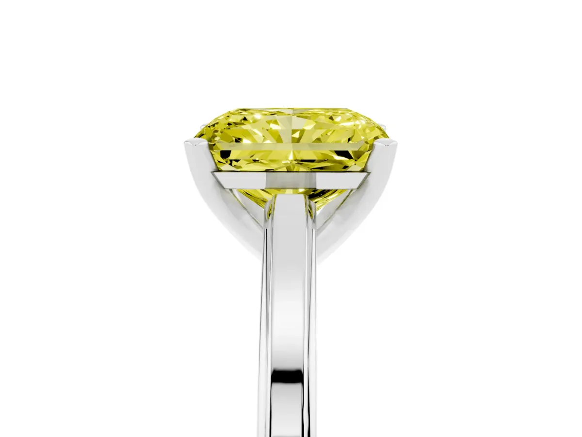 Fancy Yellow Radiant Cut Solitaire Diamond Ring with Four-Prong Setting and Classic Band Silver