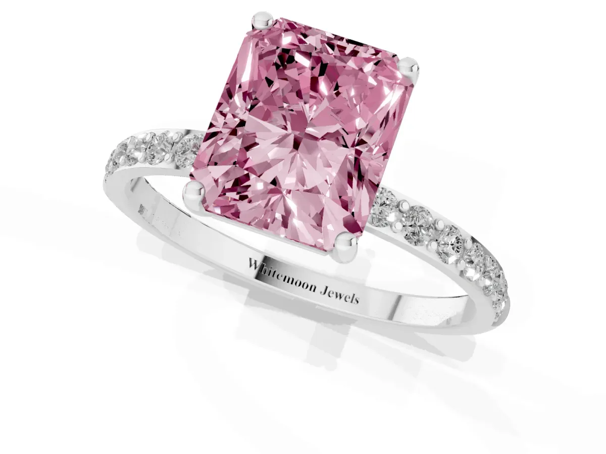 Fancy Pink Radiant Cut Diamond Solitaire Ring with Round Pavé Shoulders and Prong Setting Silver