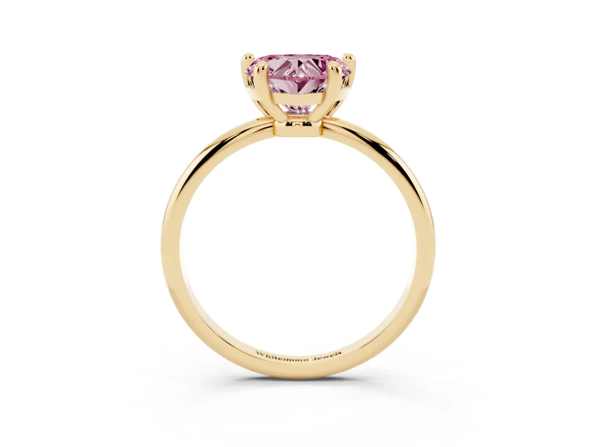 Fancy Pink Heart Cut Solitaire Diamond Ring with 4-Prong Setting on a Classic Band Yellow gold