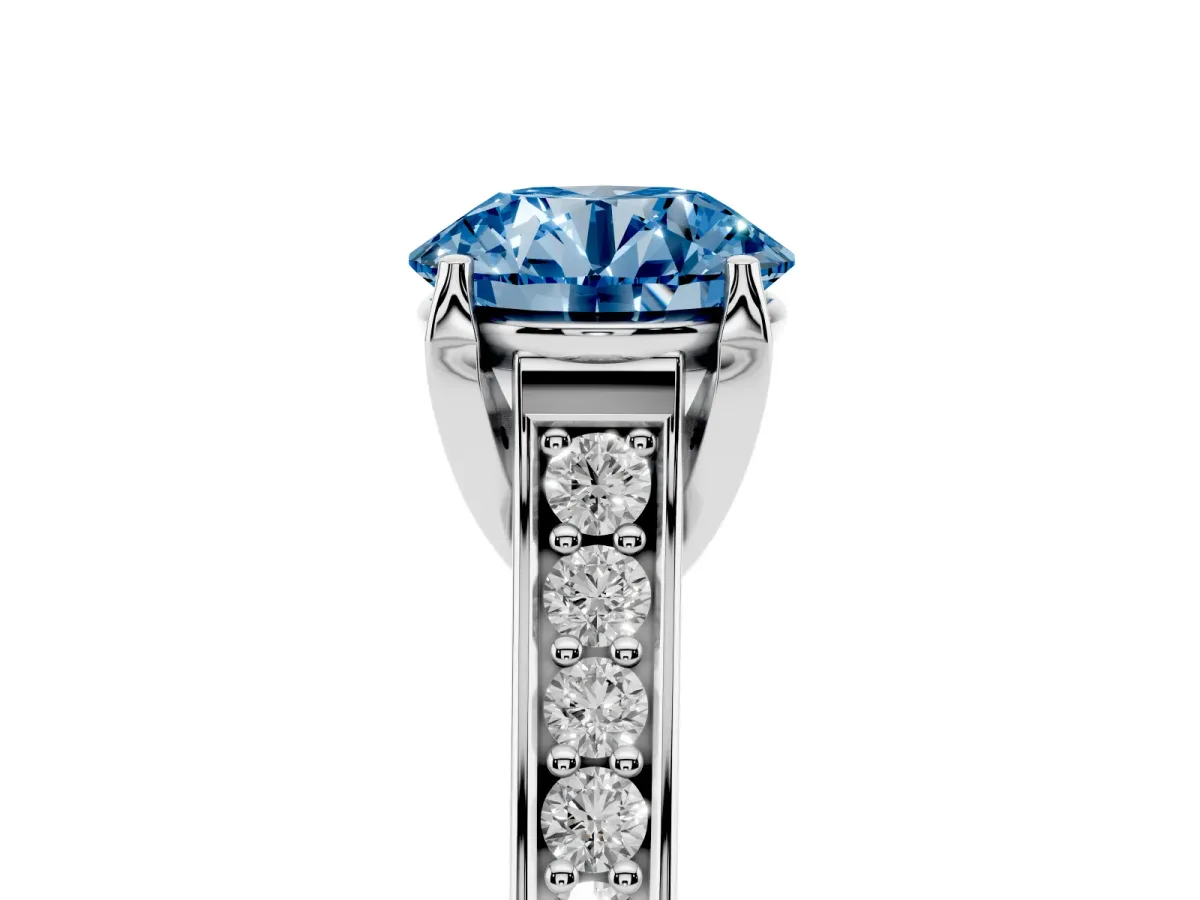 Fancy Blue Round Cut Brilliant Cut Diamond Engagement Ring with Pavé Band and Four-Prong Setting White gold