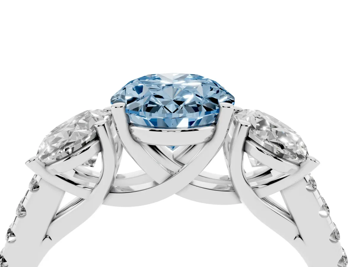 Fancy Blue Three-Stone Oval Cut Diamond Ring with Round Pavé Band and Prong Setting Silver