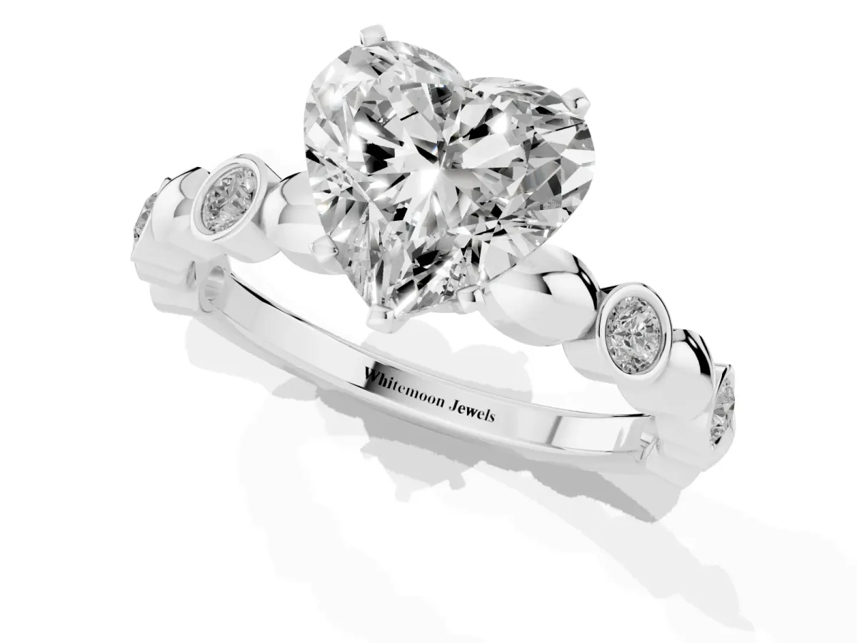 Heart Cut Solitaire Bezel-Set Diamond Ring with Beaded Band and Four-Prong Setting Silver