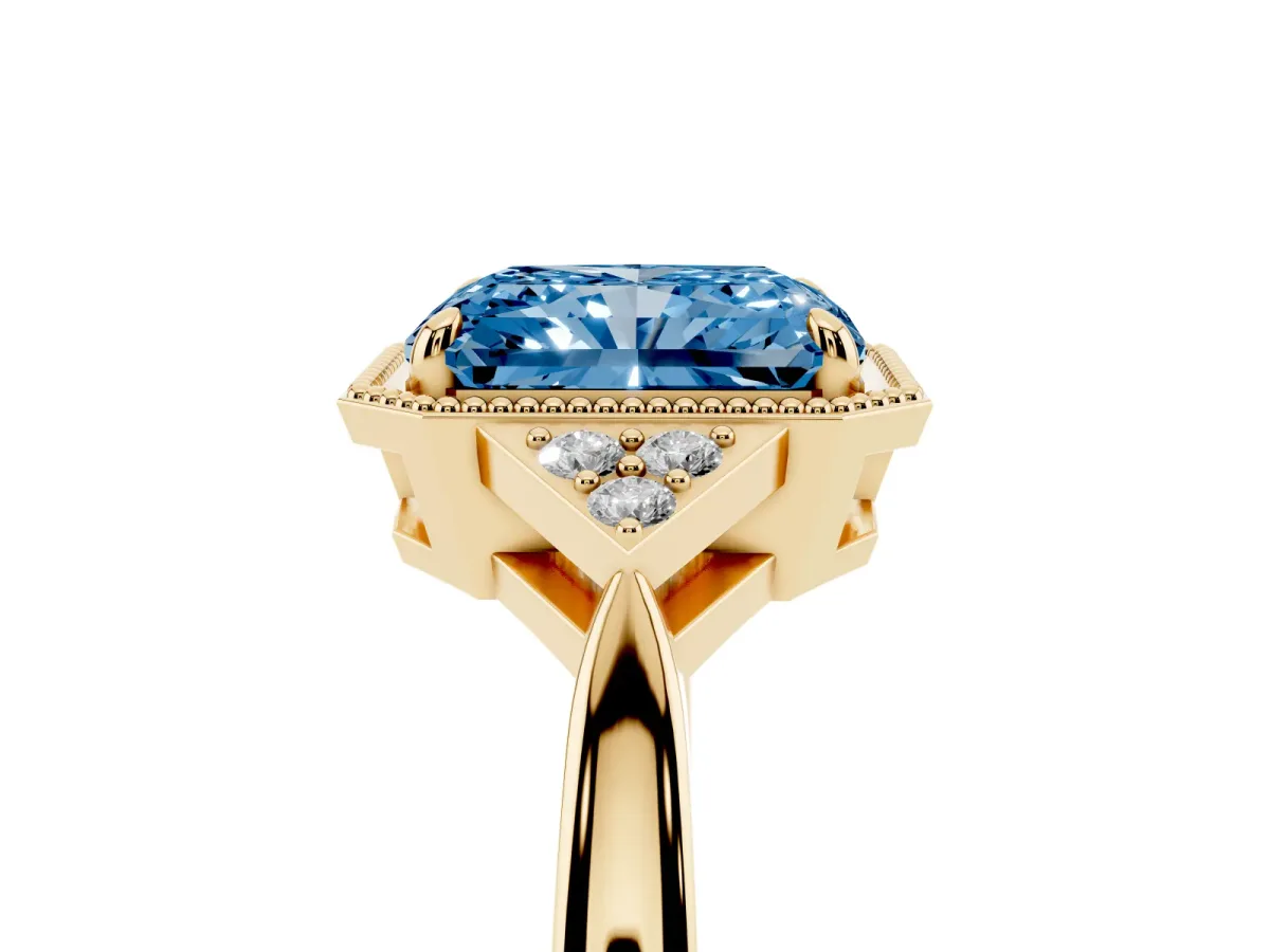 Fancy Blue Radiant Cut Diamond Halo Ring with Tapered Band and Four-Prong Setting Yellow gold