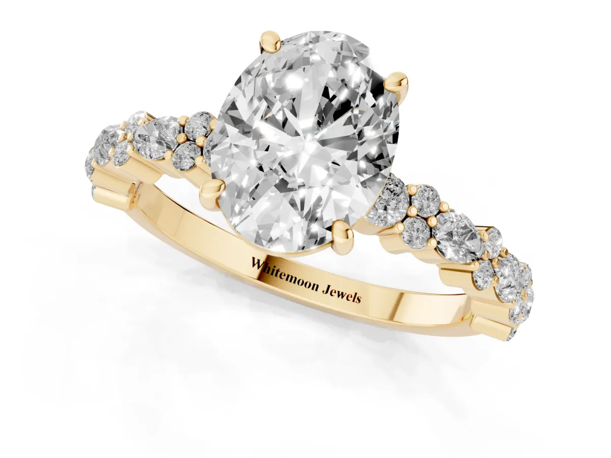 Oval Cut Diamond Side Stone Solitaire Ring with Round and Four-Prong Setting Yellow gold