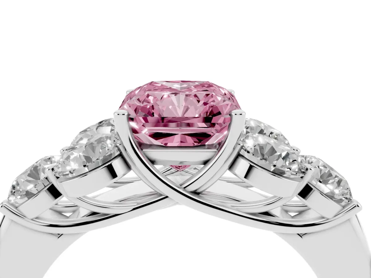 Fancy Pink Radiant Cut Cut Diamond Cluster Ring with Round Accent Stones and Prong Setting on a Classic Band White gold