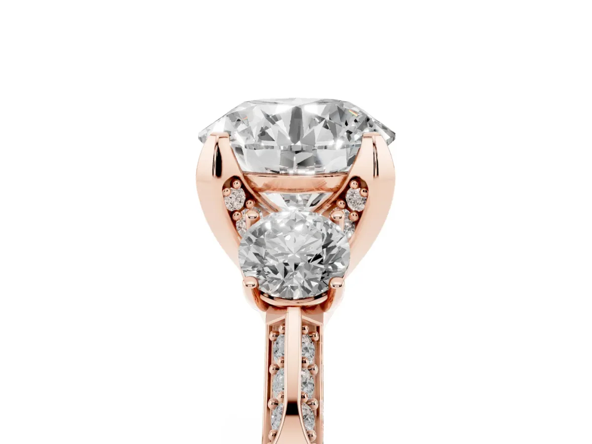 Round Cut Brilliant Three-Stone Diamond Ring with Pavé Band and Four-Prong Setting Rose gold