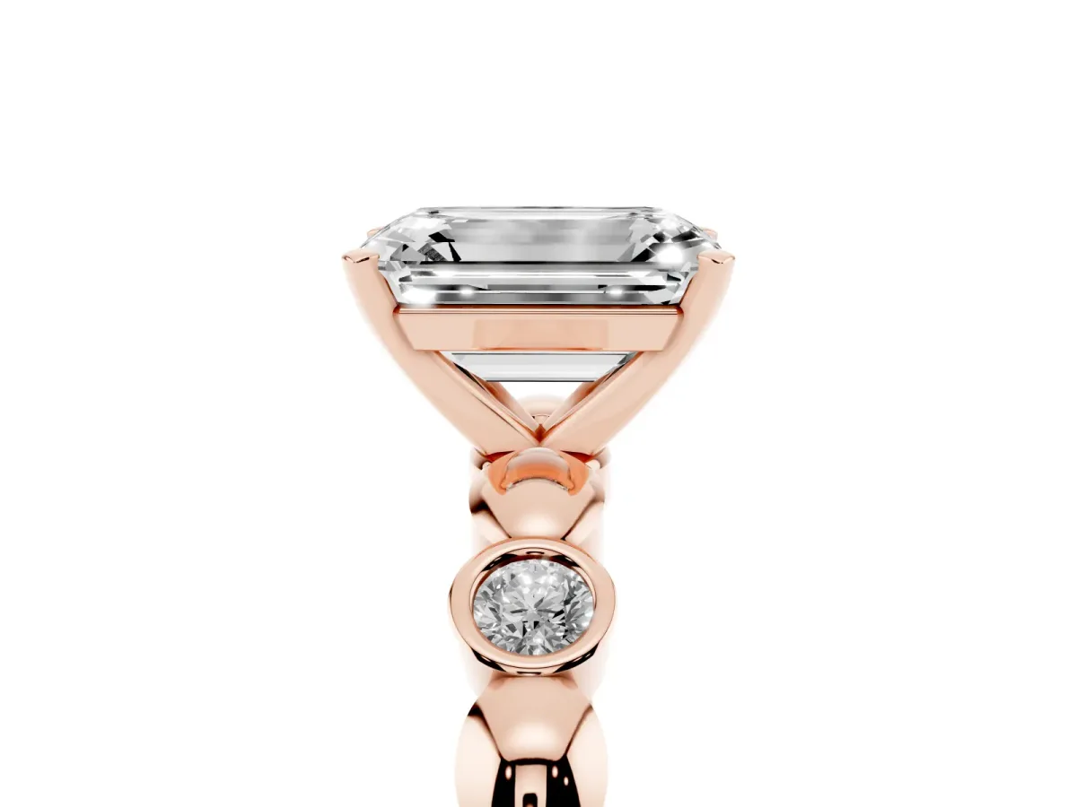Emerald Cut Solitaire Bezel-Set Diamond Ring with Beaded Band and Four-Prong Setting Rose gold