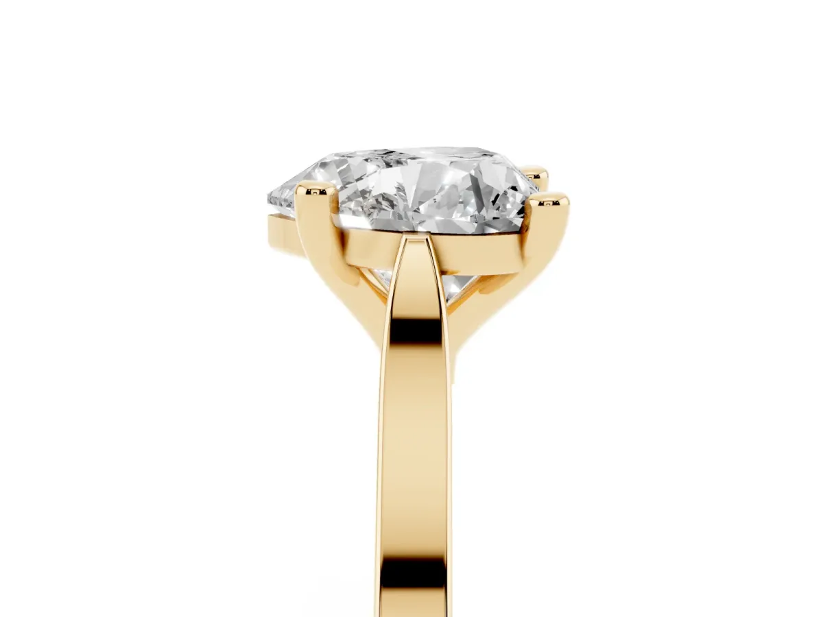 Heart Cut Solitaire Diamond Ring with Four-Prong Setting and Tapered Band Yellow gold