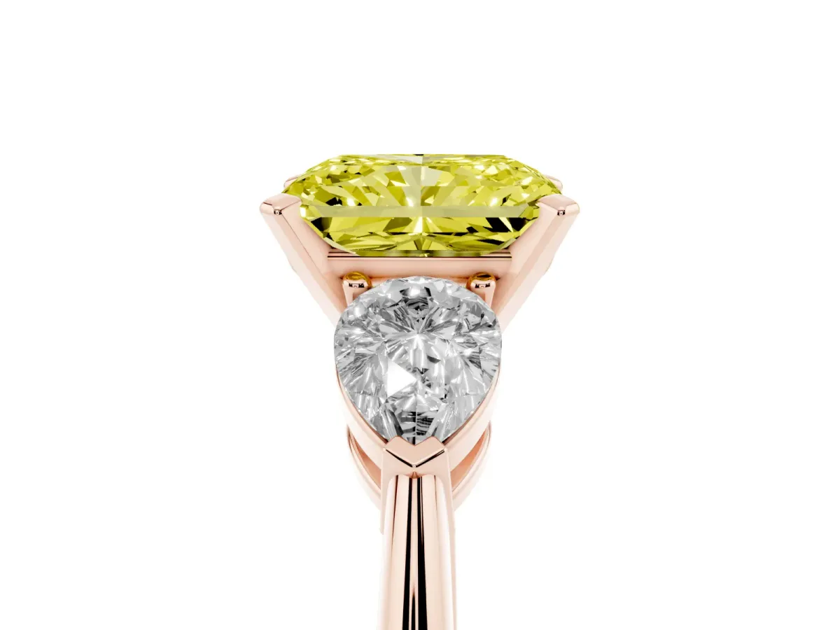 Fancy Yellow Three-Stone Radiant Cut Diamond Ring with Pear Side Stones and Four-Prong Setting Rose gold