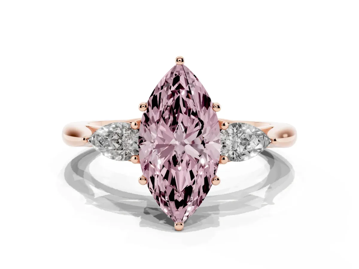 Fancy Pink Three-Stone Marquise Cut Diamond Ring with Pear Side Stones in Four-Prong Setting Rose gold