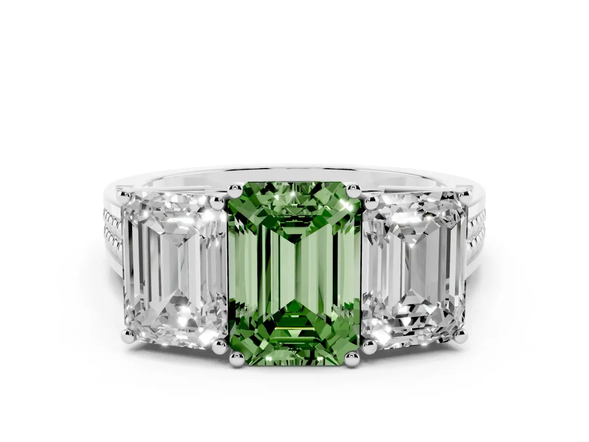 Fancy Green Emerald Cut Diamond Three-Stone Ring with Prong Setting and Textured Band Silver