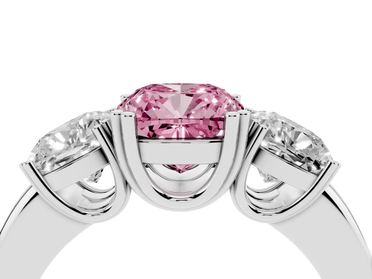 Fancy Pink Three-Stone Cushion Cut Cut Diamond Ring with Channel Set Band and Four-Prong Setting Platinum