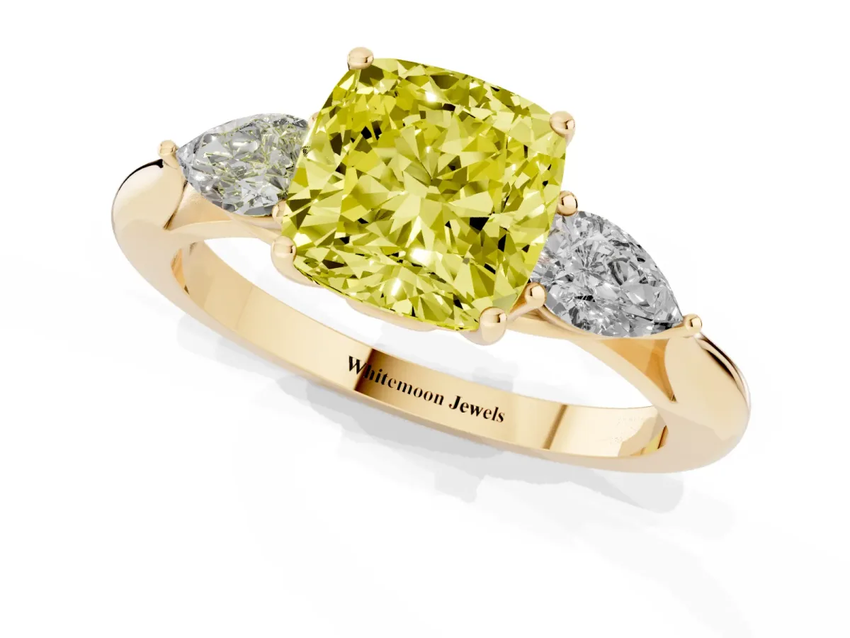 Fancy Yellow Three-Stone Cushion Cut Brilliant Diamond Solitaire Ring with Tapered Band and Four-Prong Setting Yellow gold