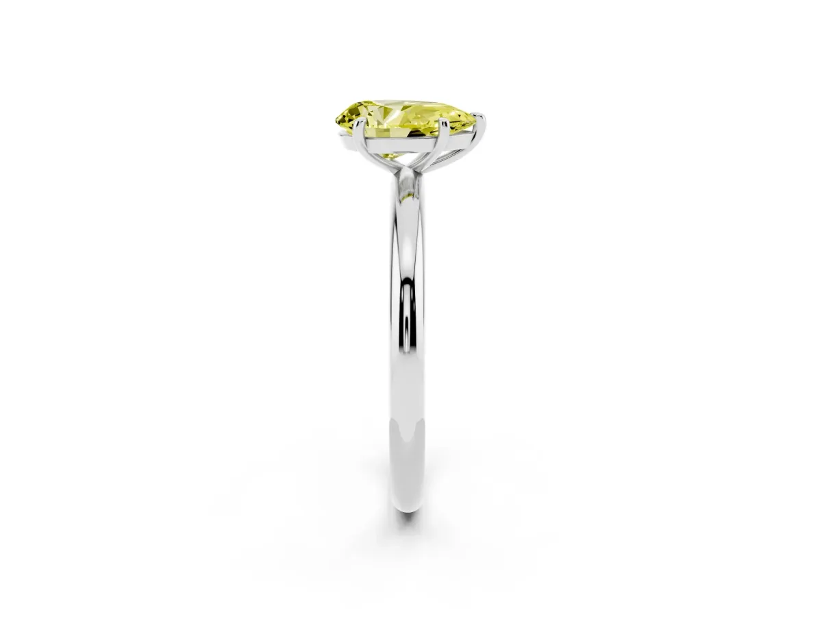 Fancy Yellow Pear Cut Solitaire Diamond Ring with Four-Prong Setting on a Plain Band White gold