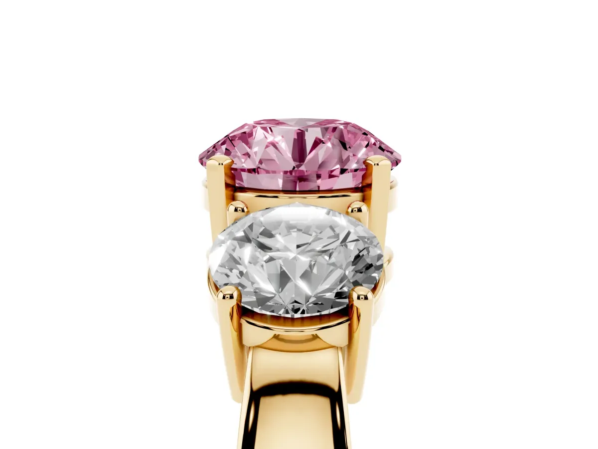 Fancy Pink Three-Stone Round Cut Diamond Ring with Round Side Stones, Classic Band, and Four-Prong Setting Yellow gold