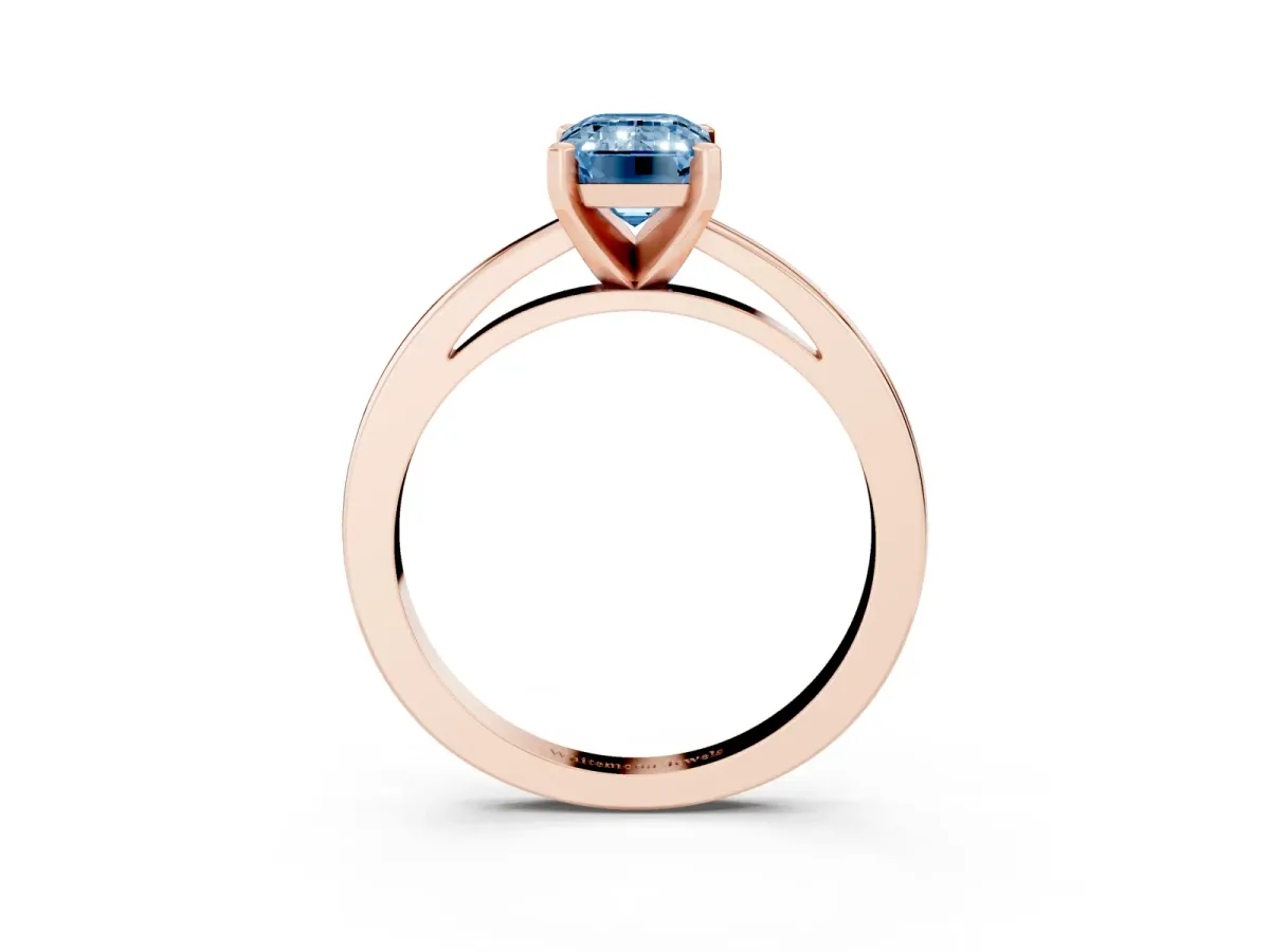 Fancy Blue Emerald Cut Solitaire Diamond Engagement Ring with Four-Prong Setting on a Classic Band Rose gold