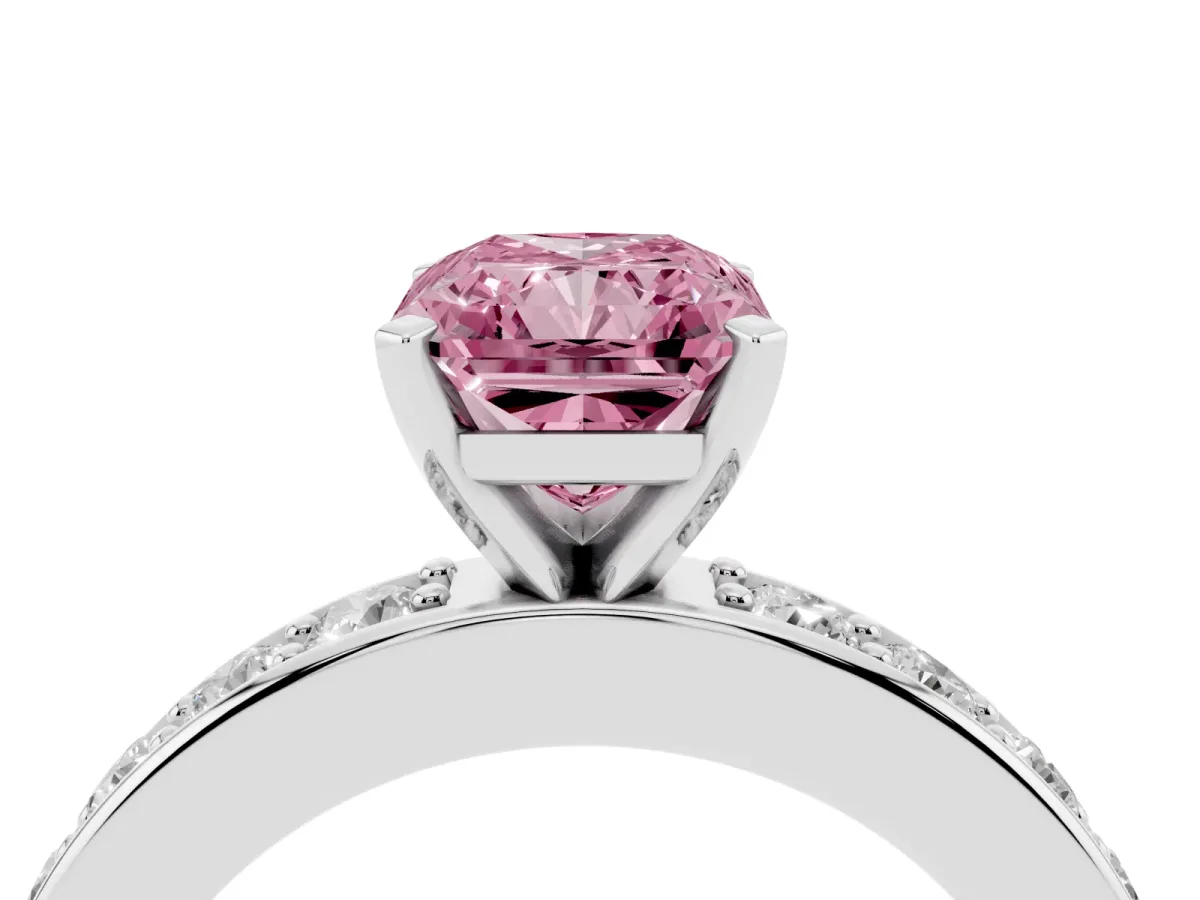 Fancy Pink Radiant Cut Diamond Engagement Ring with Channel Set Round Band and Prong Setting Platinum