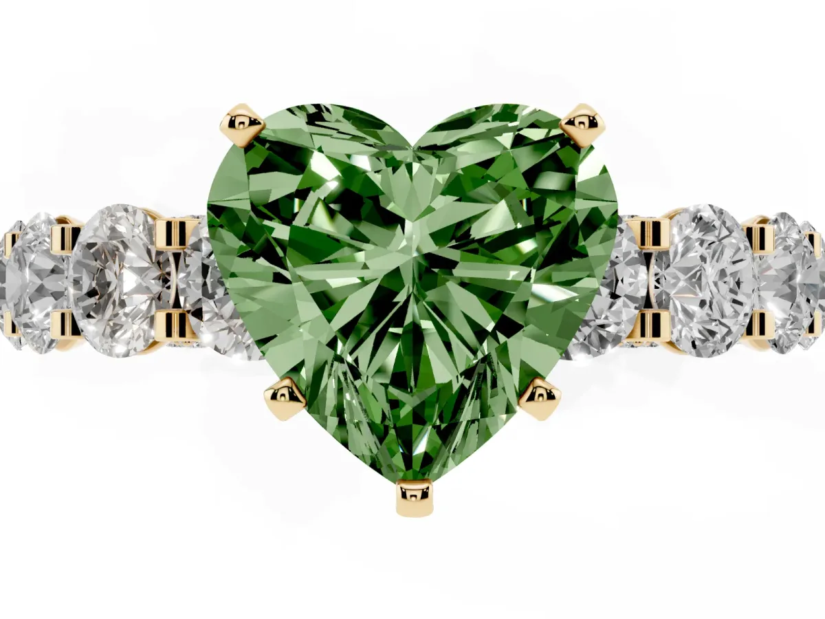 Fancy Green Heart Cut Diamond Side Stone Engagement Ring with Four-Prong Setting Yellow gold