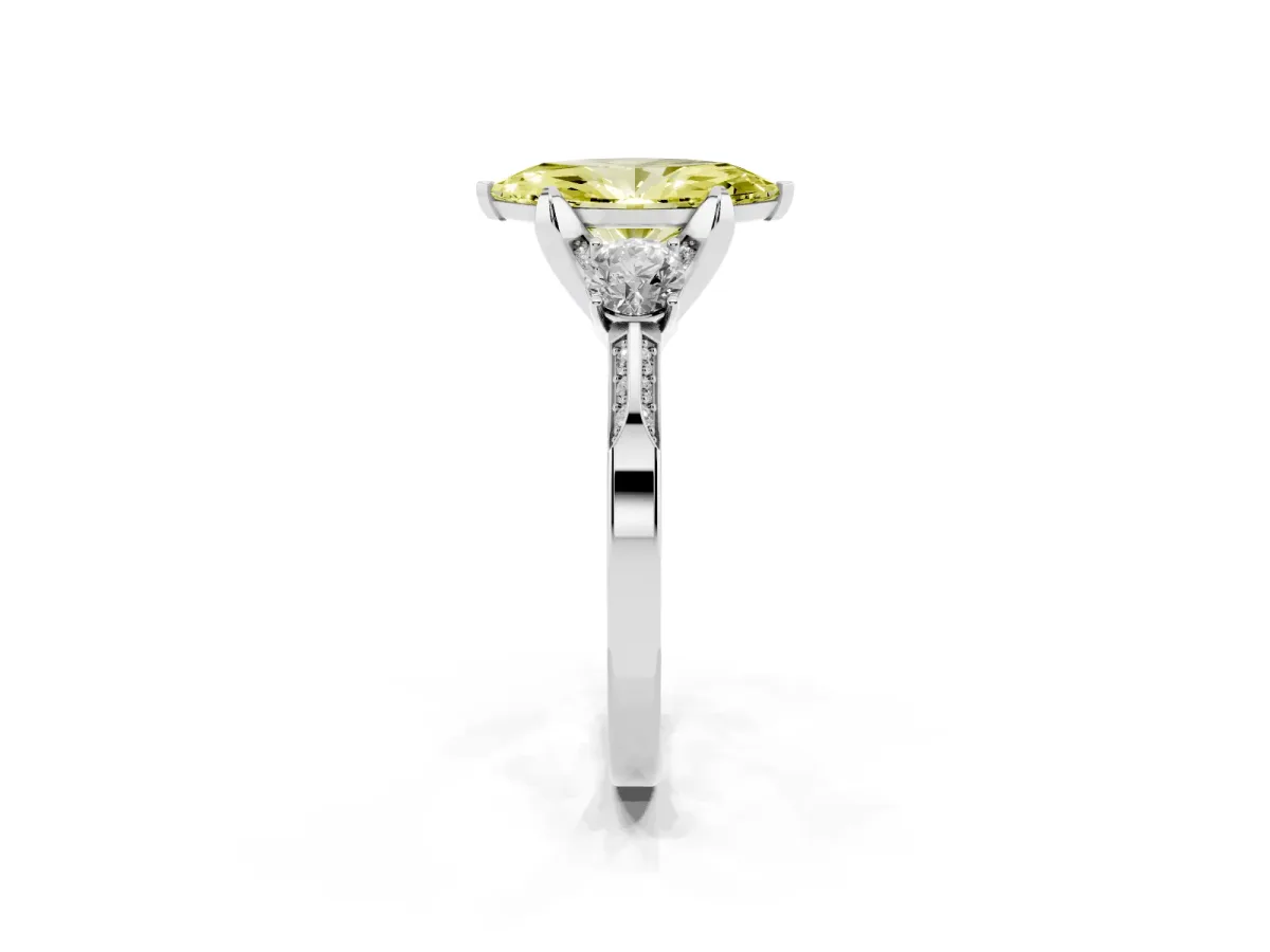 Fancy Yellow Marquise Cut Brilliant Three-Stone Diamond Ring with Pavé Band and Four-Prong Setting Platinum