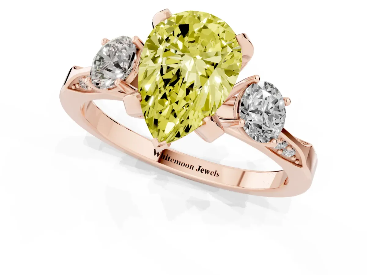 Fancy Yellow Pear Cut Brilliant Three-Stone Diamond Ring with Pavé Band and Four-Prong Setting Rose gold