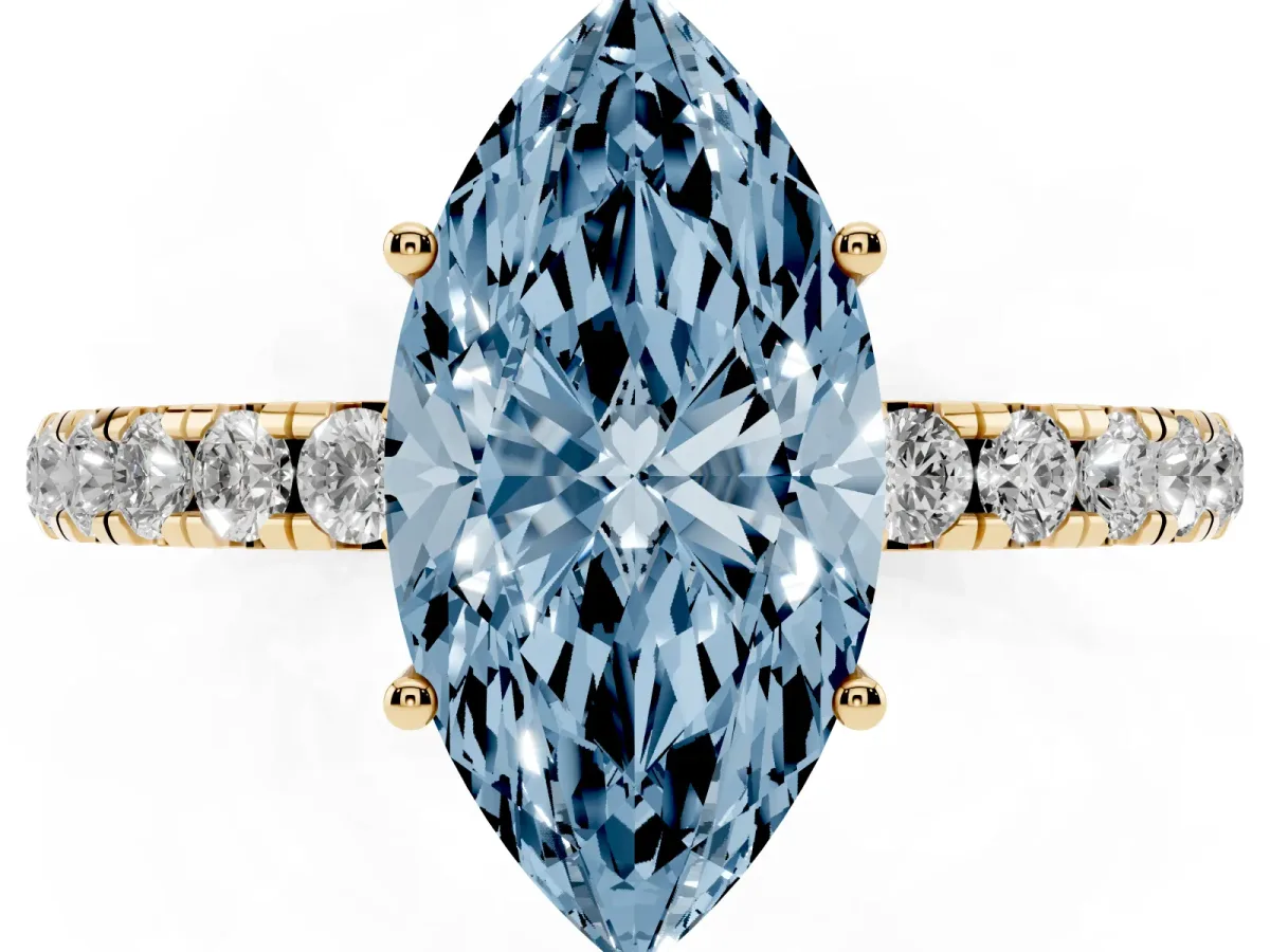 Fancy Blue Marquise Cut Diamond Pavé Solitaire Engagement Ring with Four-Prong Setting Yellow gold