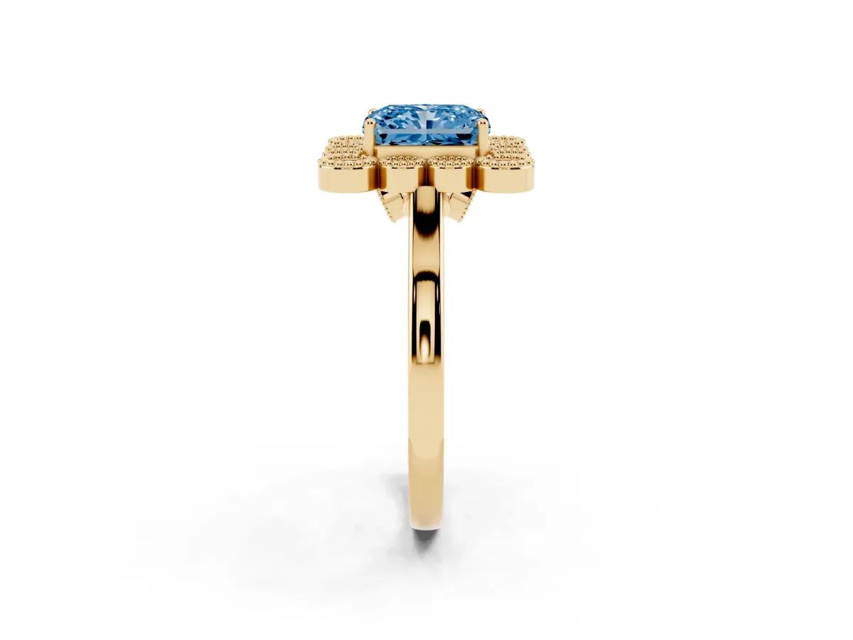 Fancy Blue Radiant Cut Halo Diamond Cluster Engagement Ring with Milgrain Bezel Setting and Solitaire Band Yellow gold