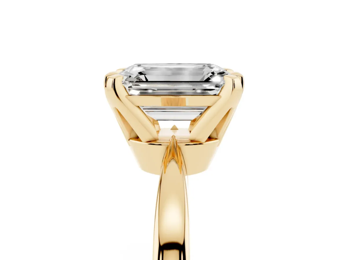 Emerald Cut Solitaire Engagement Ring with Six-Prong Setting and Tapered Band Yellow gold