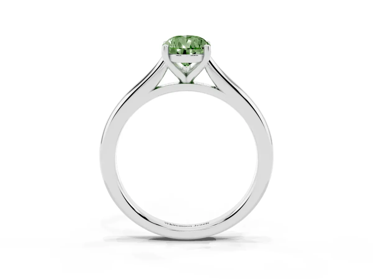 Fancy Green Pear Cut Cut Solitaire Ring with Cathedral Band and Four-Prong Setting Silver