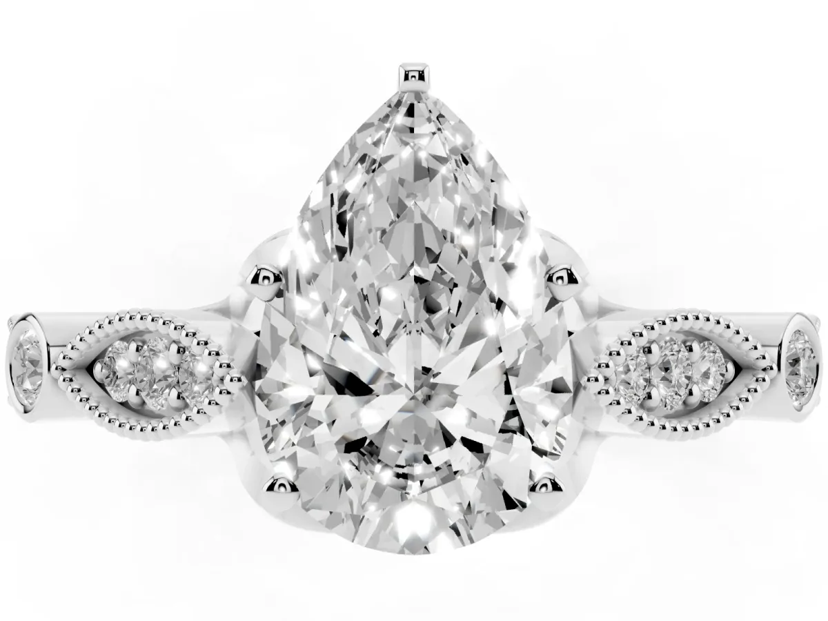 Pear Cut Cut Diamond with Milgrain Marquise and Bezel Accents on a Solitaire Band with Prong Setting Platinum