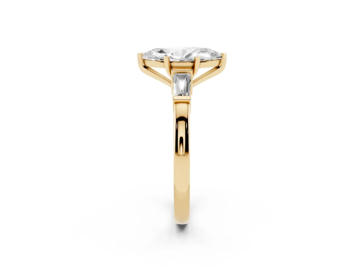 Marquise Cut Cut Diamond Solitaire Ring with Tapered Baguette Accents and Four-Prong Setting Yellow gold