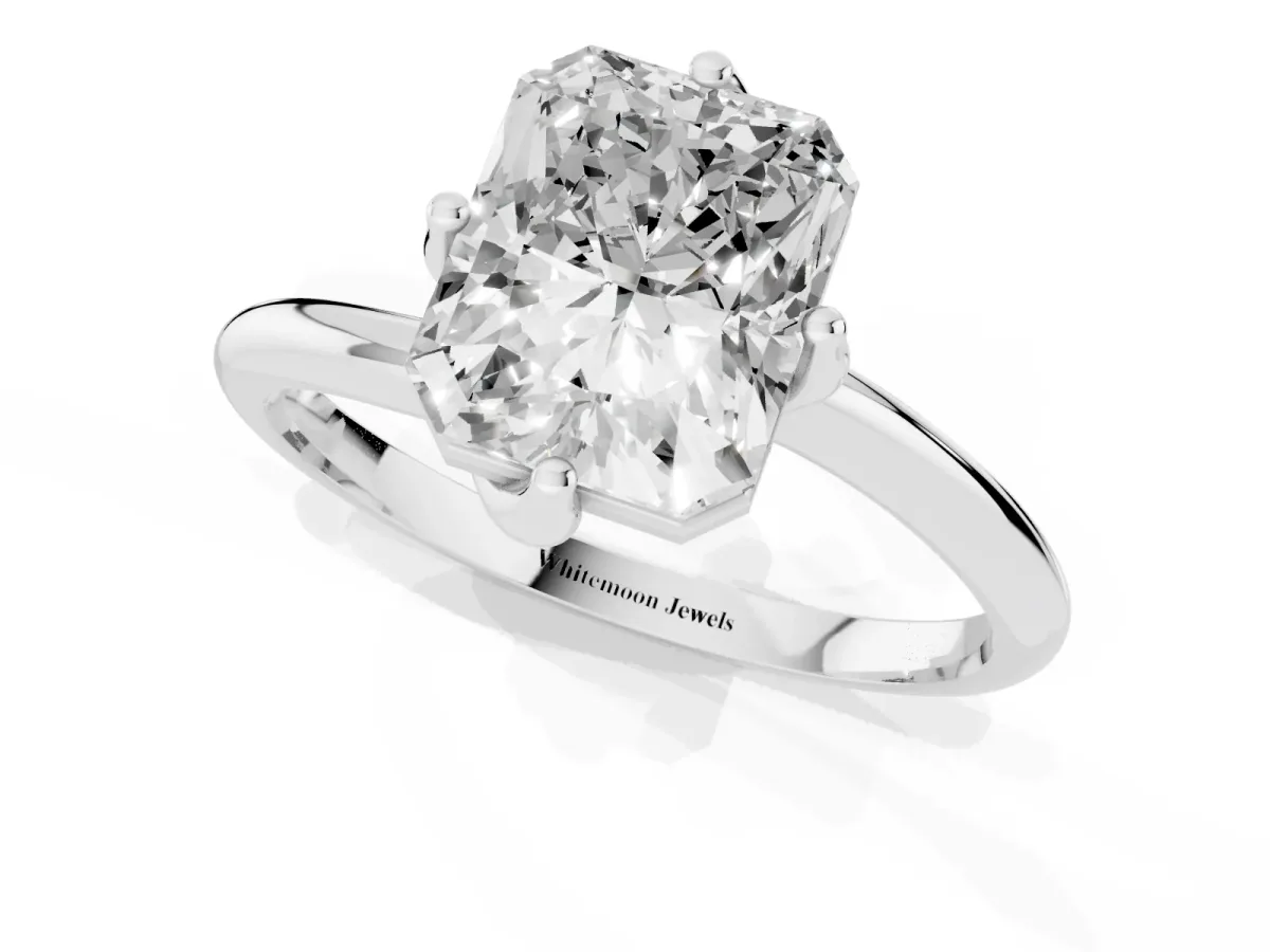 Radiant Cut Diamond Solitaire Engagement Ring with Four-Prong Setting and Classic Band Silver