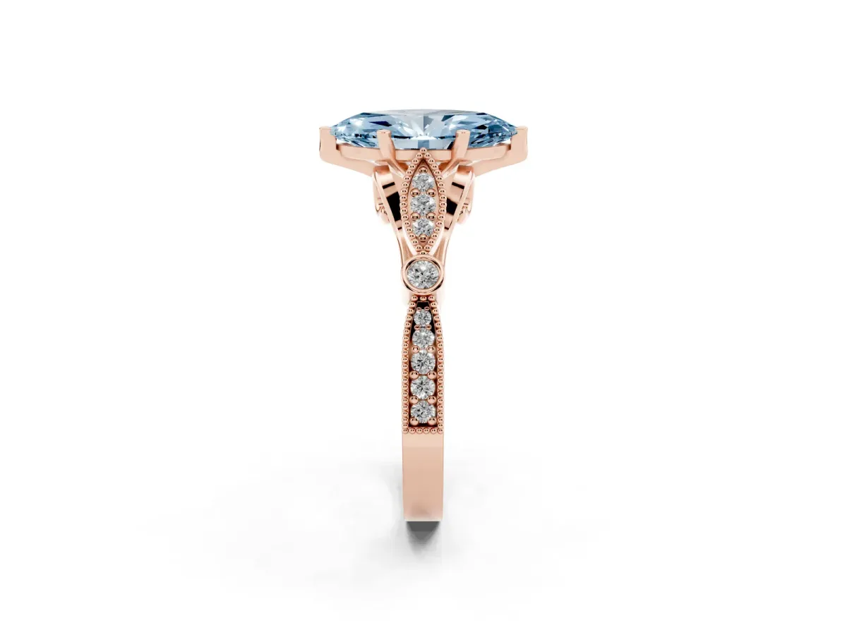 Fancy Blue Marquise Cut Cut Diamond with Milgrain Marquise and Bezel Accents on a Solitaire Band with Prong Setting Rose gold