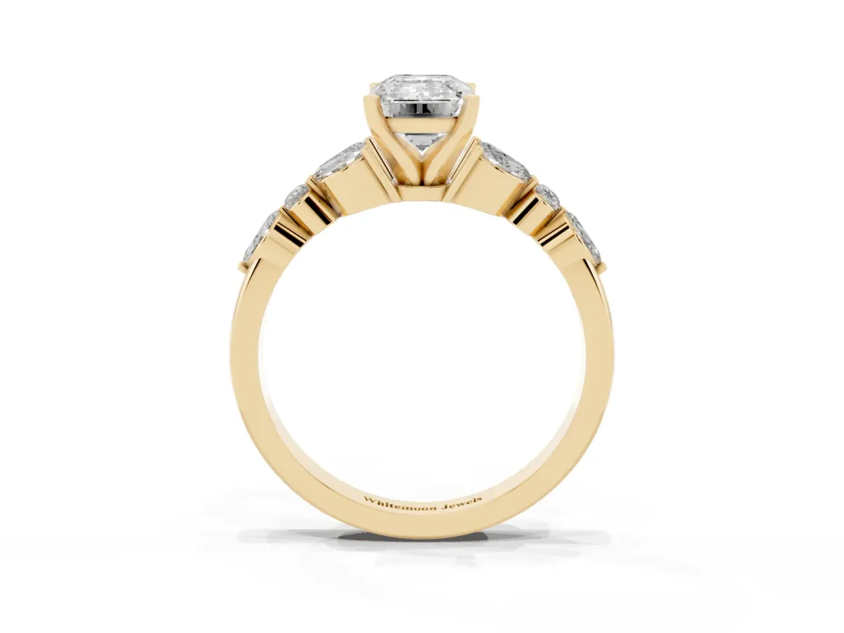 Emerald Cut Diamond Solitaire Ring with Side Stones and Four-Prong Setting Yellow gold