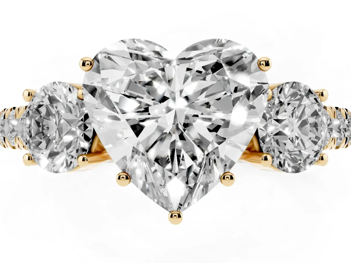 Heart Cut Cut Diamond Three-Stone Ring with Round Side Stones and Pavé Band Yellow gold