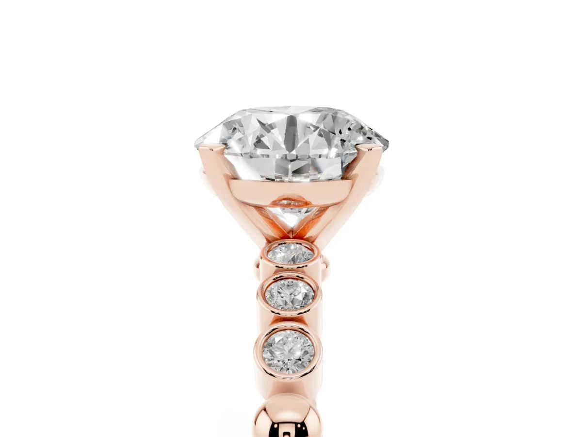 Round Cut Solitaire Bezel Accent Diamond Engagement Ring with Beaded Band and Four-Prong Setting Rose gold