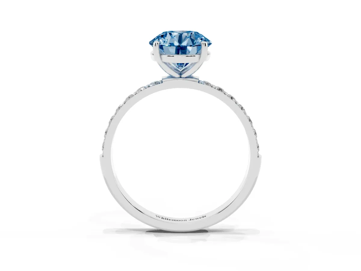 Fancy Blue Round Cut Diamond Solitaire Ring with Round Pavé Shoulders and Prong Setting Silver
