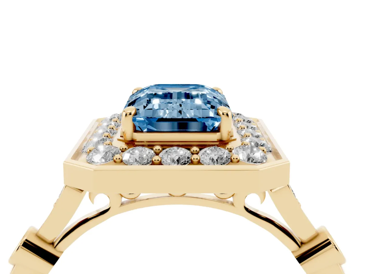 Fancy Blue Emerald Cut Halo Diamond Engagement Ring with Twisted Band and Four-Prong Setting Yellow gold